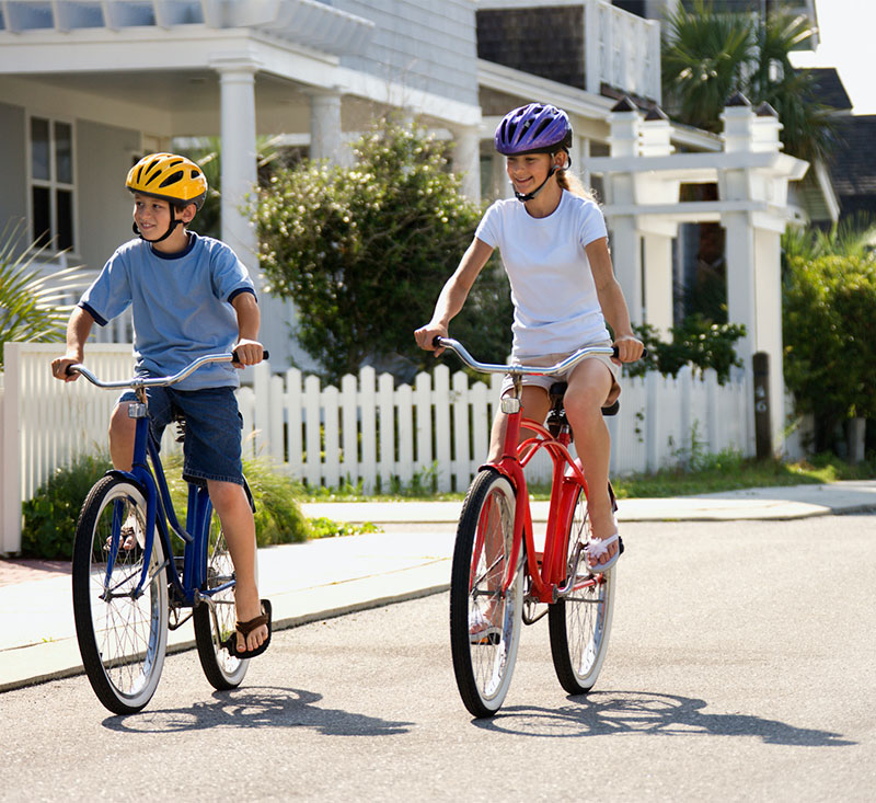 Kids cycling in Curtis Security Neighborhood