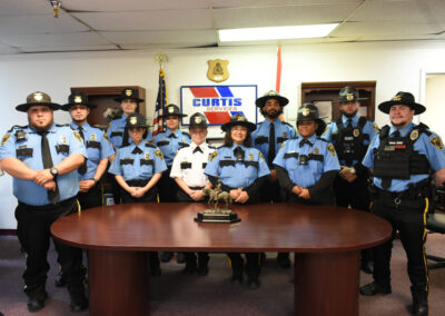 Several Curtis Security Officers in uniform
